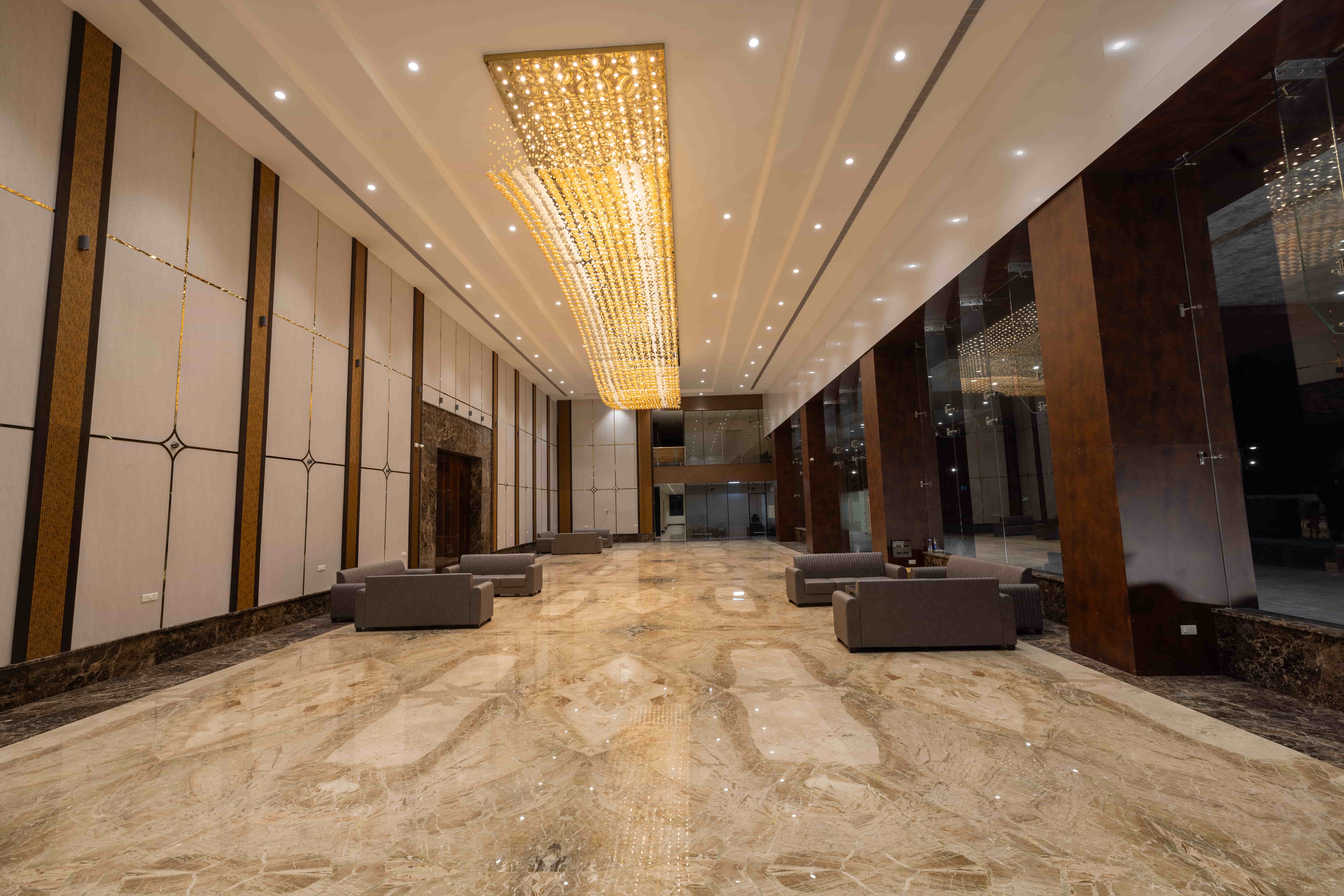 Marble-floored lobby with lounge seating at VRC Convention